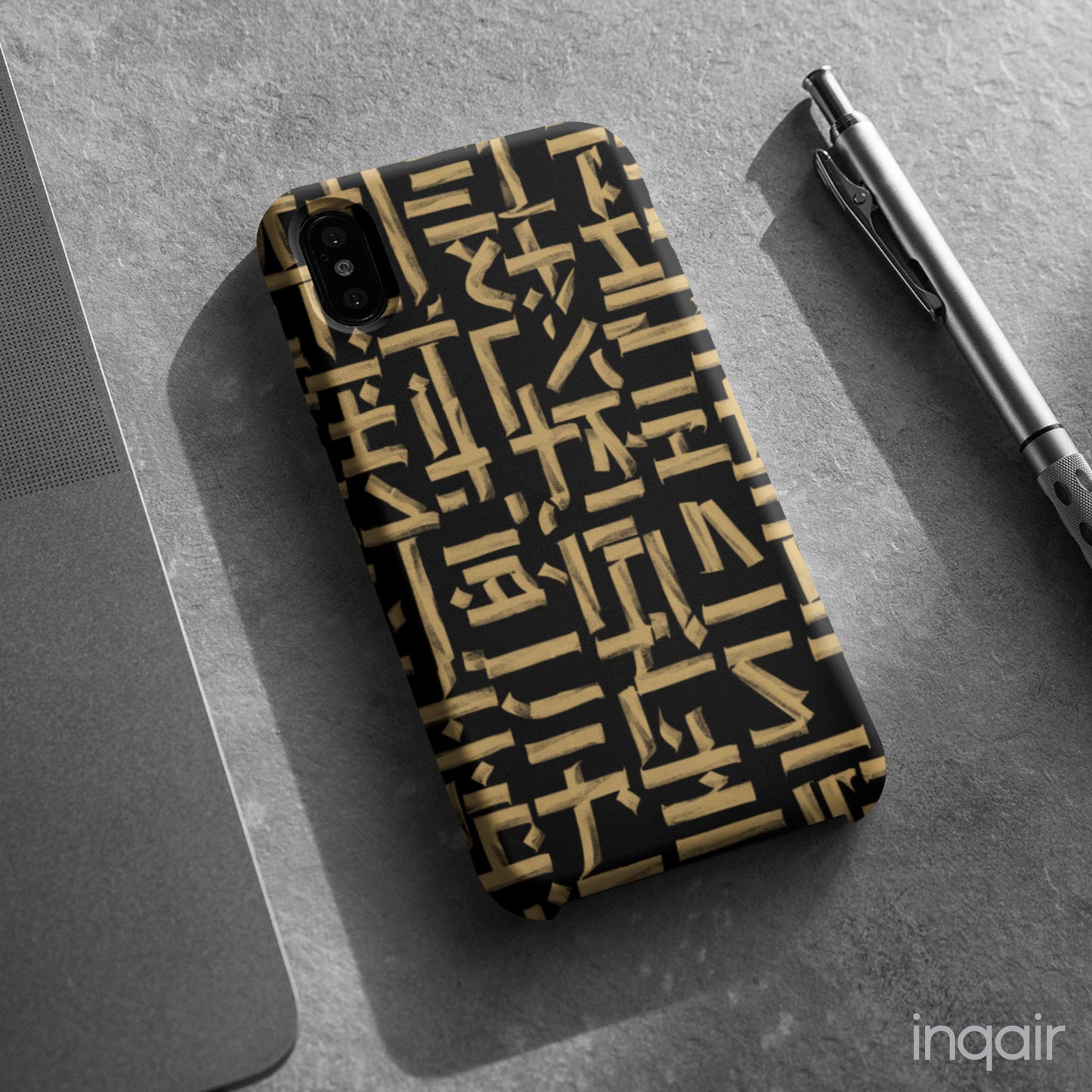 Black phone case with gold calligraphy design. Fits iPhone and Samsung models. Stylish and unique, offering both protection and a touch of luxury.